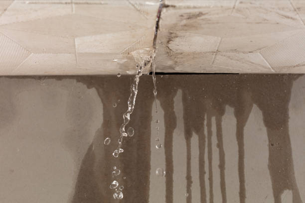 Professional Flood Damage Cleanup technician working in Harwick, PA